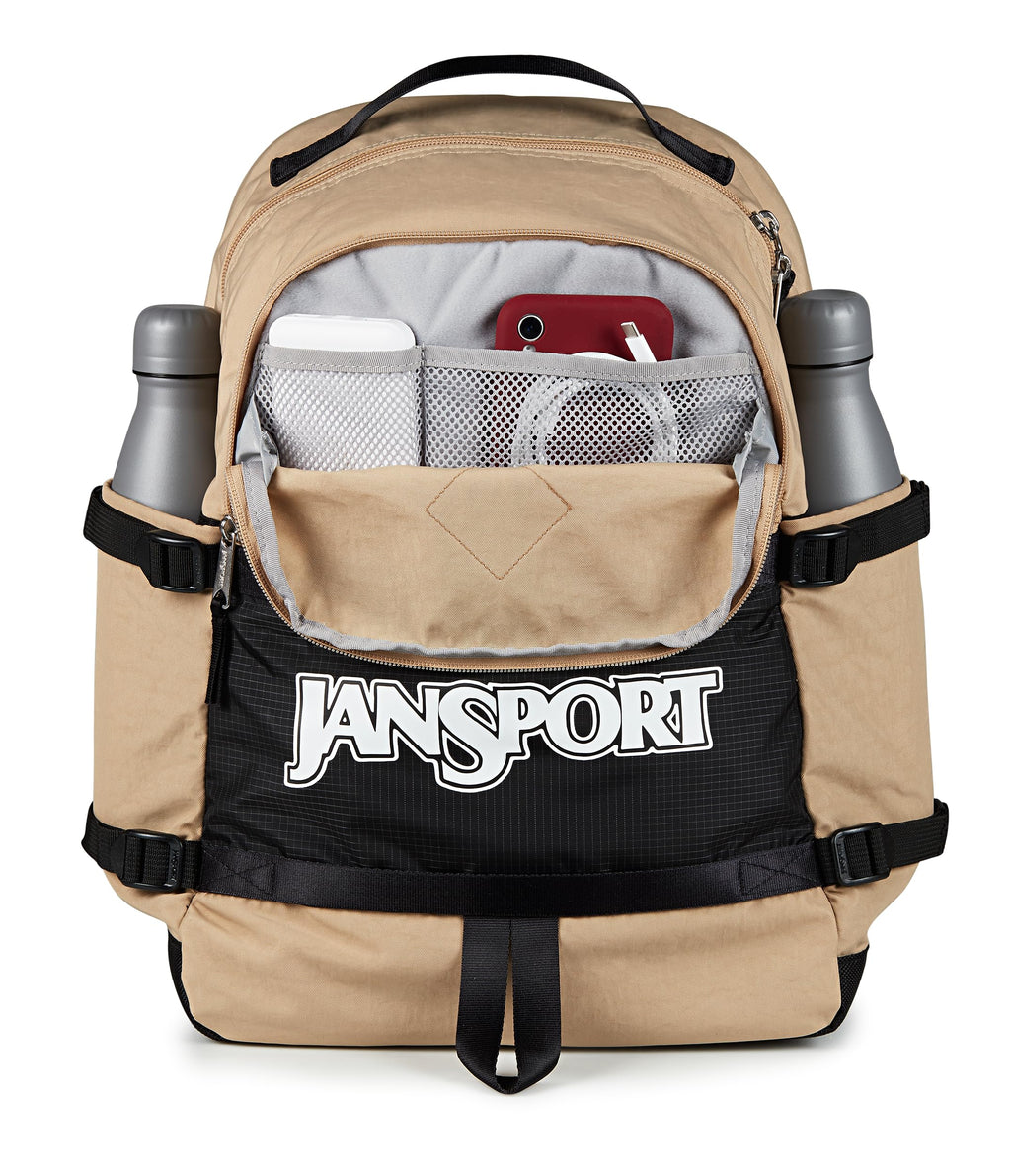 JanSport Small Seattle Pack – Compact Backpack with Main Compartment, Dual Water Bottle Pockets, and Padded Sleeve for 15-Inch Laptop, Travertine