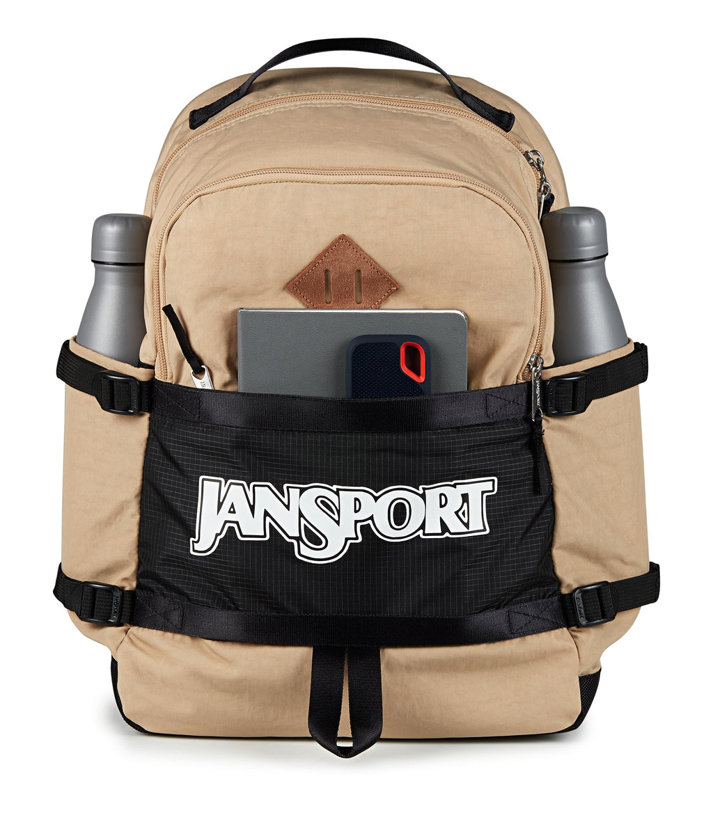 JanSport Small Seattle Pack – Compact Backpack with Main Compartment, Dual Water Bottle Pockets, and Padded Sleeve for 15-Inch Laptop, Travertine